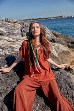 Load image into Gallery viewer, Bosphorus scarf from Istanbul Collection reimagines the beauty of Istanbul with the iconic Galata Tower and mesmerizing city skyline, with soothing shades of red, gold, blue, and green. A wearable piece of art with contemporary and fractal patterns.