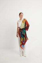 Load image into Gallery viewer, Bosphorus scarf from Istanbul Collection reimagines the beauty of Istanbul with the iconic Galata Tower and mesmerizing city skyline, with soothing shades of red, gold, blue, and green. A wearable piece of art with contemporary and fractal patterns.