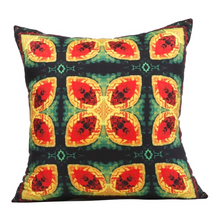 Load image into Gallery viewer, Front view of square %100 pure silk throw pillow, designed specially with fractal formulas and hand manufactured in limited numbers. Has symmetrically distributed floral motifs with dominant colors of red, yellow, black, green.Printed on both sides.