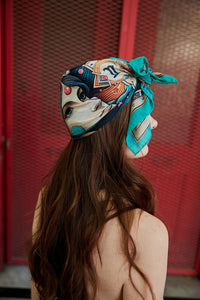 FAD Astrology-Themed Cotton Voile Bandana from Mythology Collection. With intricate fractal patterns inspired by archeological signs, this luxurious modern scarf features vibrant colors, is handstitched on edges and printed on highest-quality fabric.