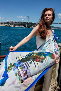 Istanbul Silhouettes chiffon shawl is a tribute to the captivating charm of Istanbul, unifying the natural and historical elements of the city, capturing the soothing tones of the Bosphorus and the blue sky with fractal patterns in a modern palette.
