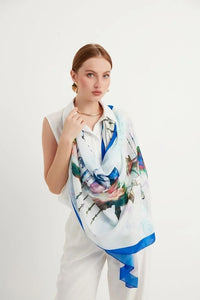 Istanbul Silhouettes chiffon shawl is a tribute to the captivating charm of Istanbul, unifying the natural and historical elements of the city, capturing the soothing tones of the Bosphorus and the blue sky with fractal patterns in a modern palette.