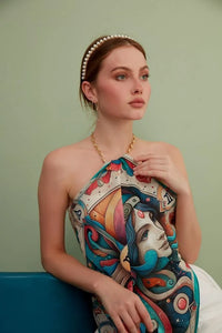 FAD Astrology-Themed Cotton Voile Bandana from Mythology Collection. With intricate fractal patterns inspired by archeological signs, this luxurious modern scarf features vibrant colors, is handstitched on edges and printed on highest-quality fabric.