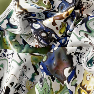 Silk Scarf & Foulard, 35" x 35" - TERRA Collection TERRA silk scarf pays tribute to the nature of life - evolving and restarting it's journey, by this elongated design of intersecting colours of earth and skies.