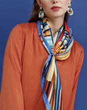 Charger l&#39;image dans la galerie, FLAME Collection 35&quot;x35&quot; Silk Scarf pays tribute to the intertwined nature of fire - growing and evolving, by this elongated design of intersecting colours of flame and heat. Produced in limited numbers, hand-rolled on edges and hand stitched.
