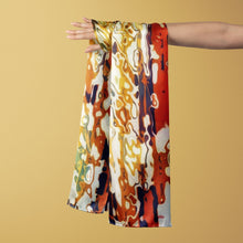 Charger l&#39;image dans la galerie, FLAME Collection 27&quot;x78&quot; Large Silk Shawl pays tribute to the intertwined nature of fire - growing and evolving, by this elongated design of intersecting colours of flame and heat. Produced in limited numbers, hand-rolled on edges and hand stitched.
