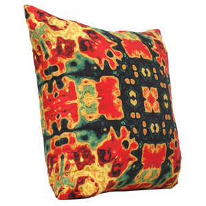 Side view of square %100 pure silk throw pillow, designed specially with fractal formulas and hand manufactured in limited numbers. Has symmetrically distributed floral motifs with dominant colors of red, yellow, black, green.Printed on both sides.